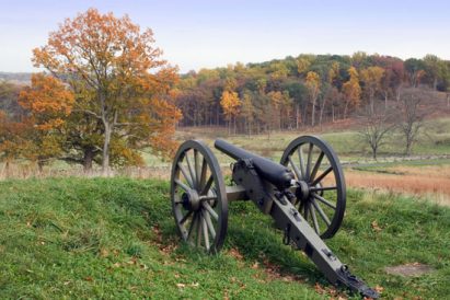 Free Land Draws Grandfather in Covered Wagon Image